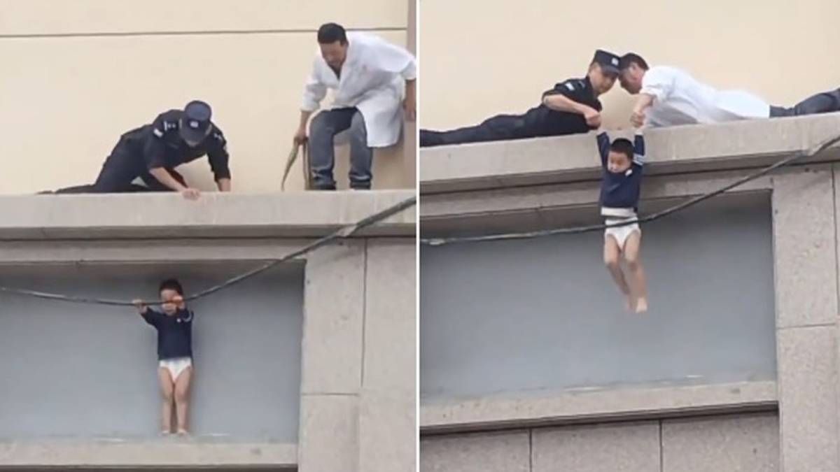 Menino de 3 anos é resgatado após ficar preso em parapeito de apartamento a 10 metros de altura na China; vídeo mostra salvamento